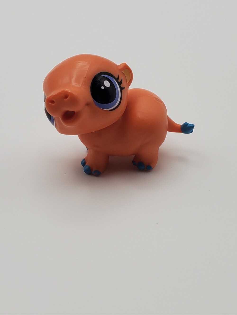 Orange Hippo Small Pet Toy Figurine with Blue Accents